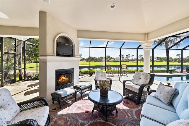 view of patio / terrace with an outdoor living space with a fireplace