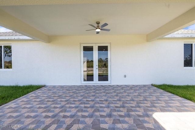 view of patio featuring a ceiling fan and french doors