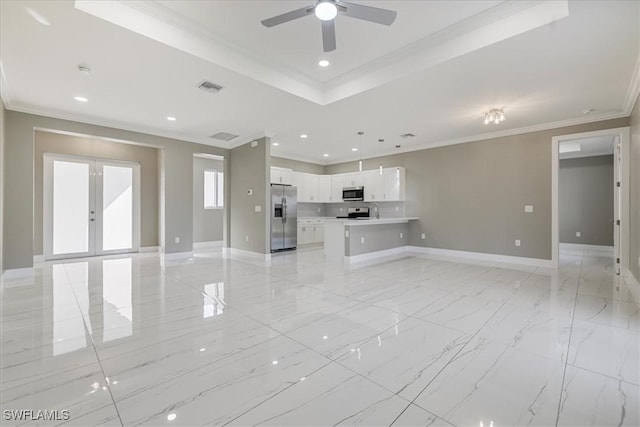 unfurnished living room featuring french doors, marble finish floor, visible vents, ornamental molding, and baseboards