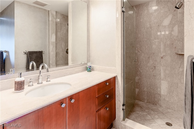 bathroom with vanity and walk in shower