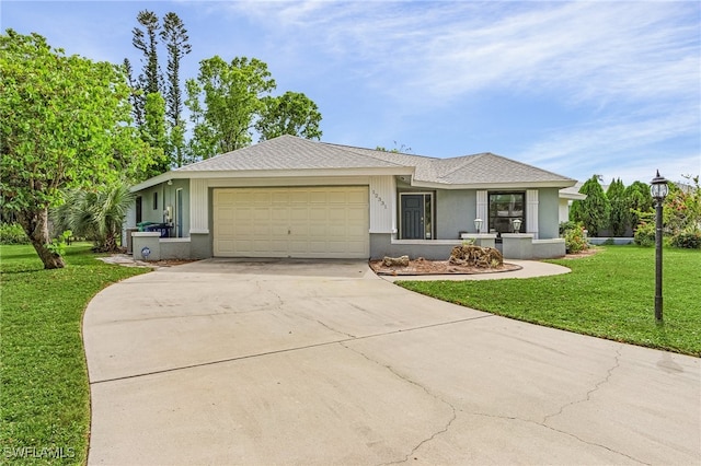 single story home featuring a front yard and a garage