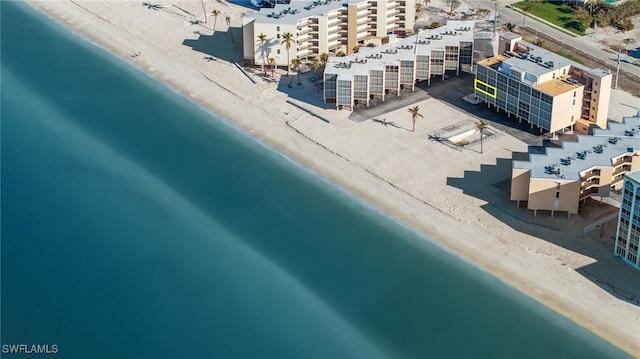 drone / aerial view with a view of the beach and a water view