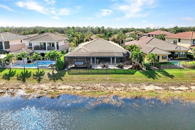 drone / aerial view with a water view