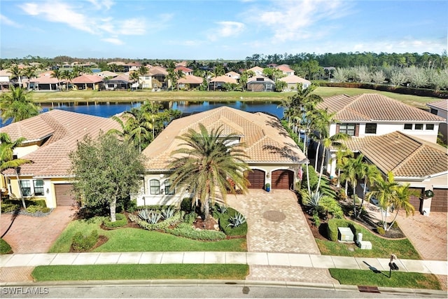 drone / aerial view with a water view