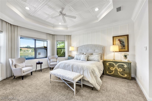 carpeted bedroom featuring crown molding, ceiling fan, and coffered ceiling