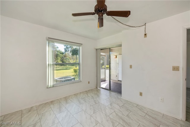 empty room featuring ceiling fan