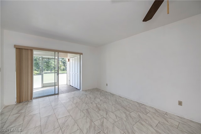 spare room featuring ceiling fan