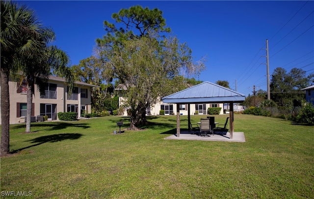 view of community featuring a gazebo and a yard