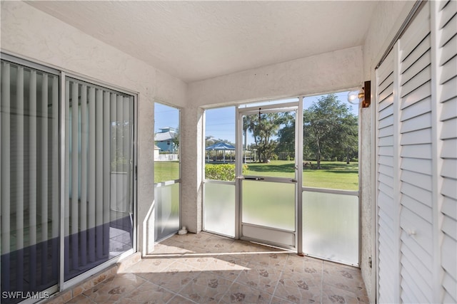 view of unfurnished sunroom