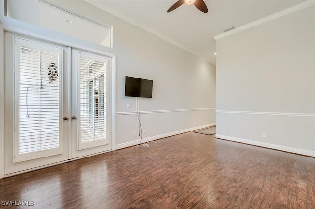 unfurnished living room with french doors, dark hardwood / wood-style flooring, ceiling fan, and crown molding