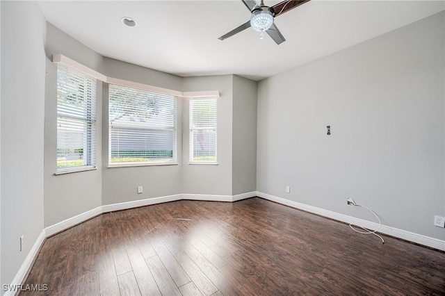 spare room featuring hardwood / wood-style floors, plenty of natural light, and ceiling fan