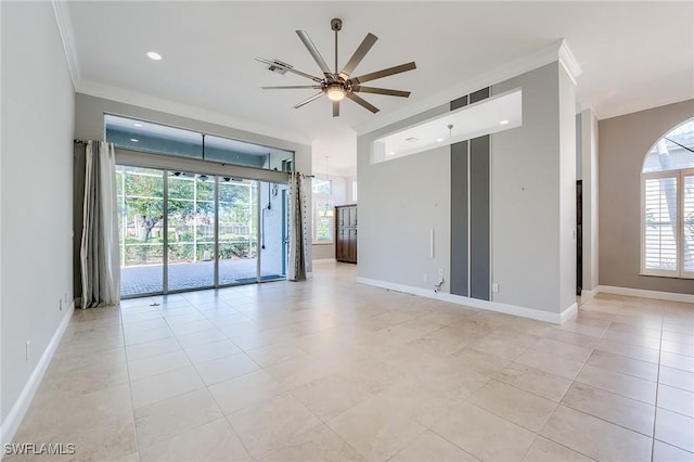 tiled empty room with crown molding, ceiling fan, and a healthy amount of sunlight