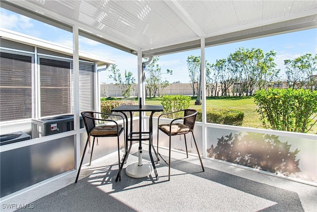 sunroom / solarium featuring a wealth of natural light