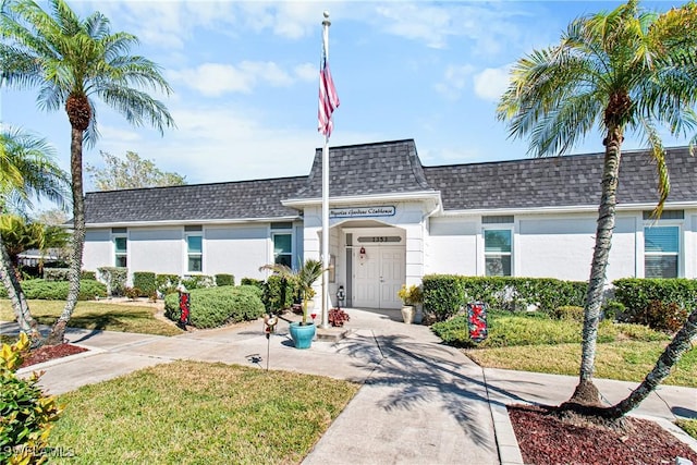 ranch-style house with a front yard