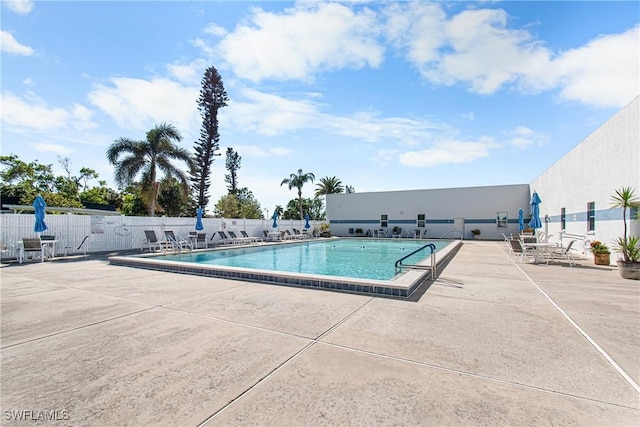 view of swimming pool featuring a patio