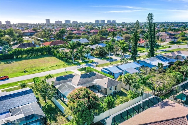 birds eye view of property with a residential view