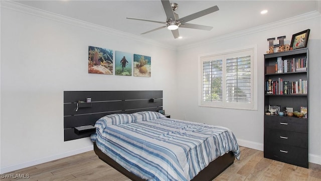 bedroom with ceiling fan, light wood-type flooring, and ornamental molding