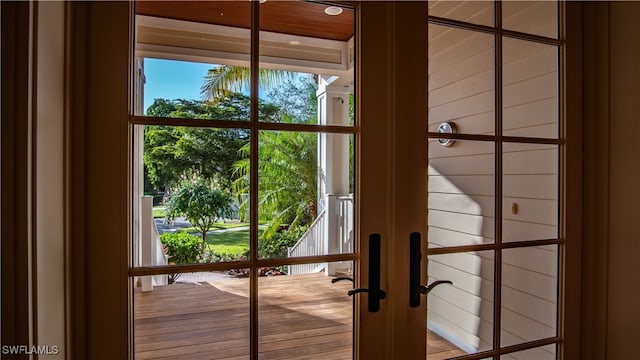 doorway featuring plenty of natural light and french doors