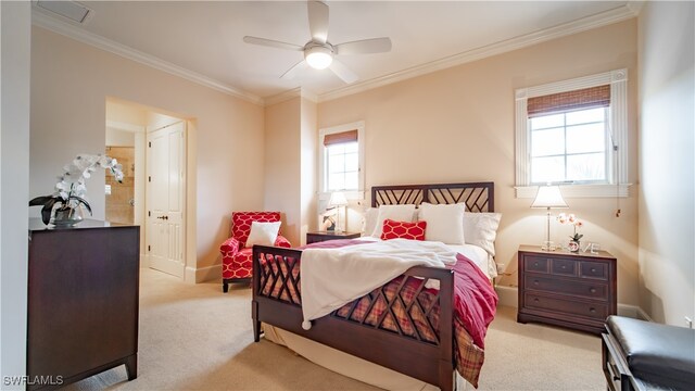 bedroom featuring multiple windows, ceiling fan, and crown molding