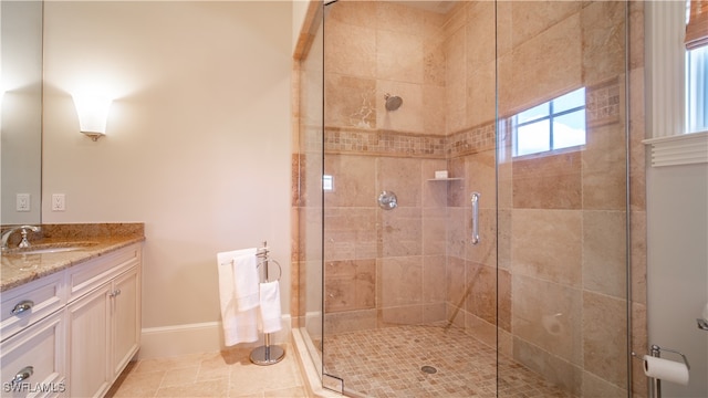 bathroom with vanity and an enclosed shower