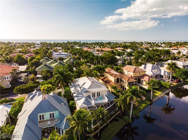 drone / aerial view with a water view