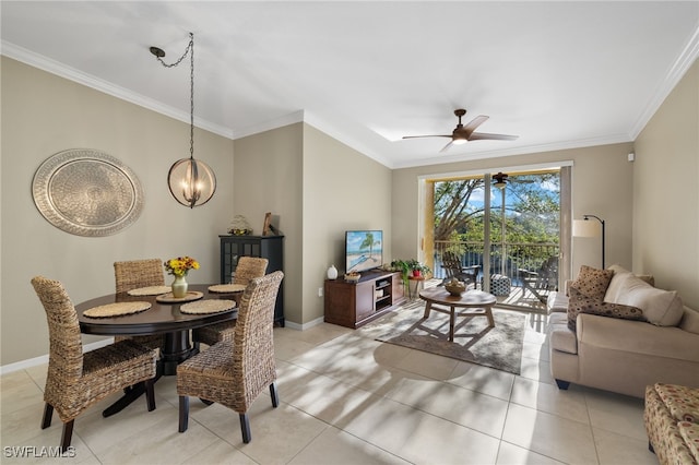 living room featuring ceiling fan with notable chandelier, ornamental molding, and light tile patterned floors