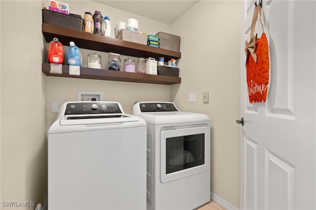 laundry room with washer and dryer