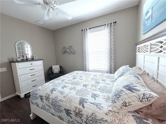 bedroom featuring ceiling fan and wood-type flooring