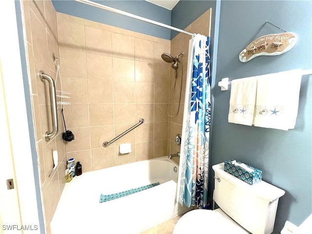 bathroom with toilet and shower / bath combo with shower curtain