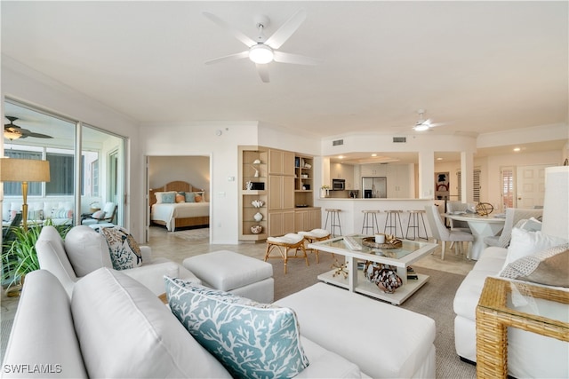 carpeted living room with ornamental molding