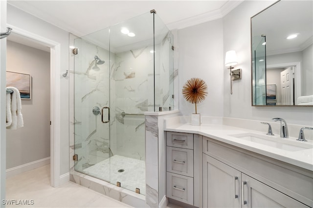 bathroom featuring vanity, tile patterned floors, a shower with door, and ornamental molding