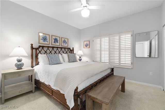 bedroom with light colored carpet and ceiling fan