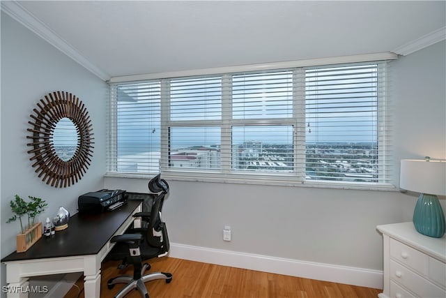 office space featuring light hardwood / wood-style floors and ornamental molding