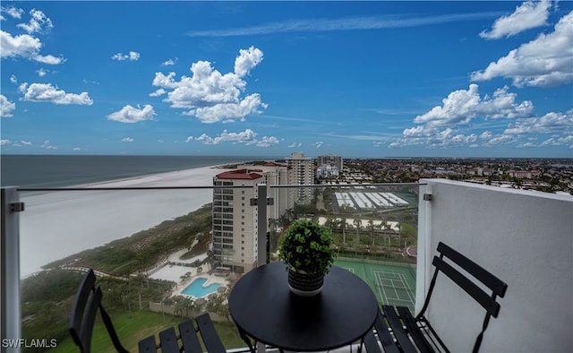 balcony featuring a water view