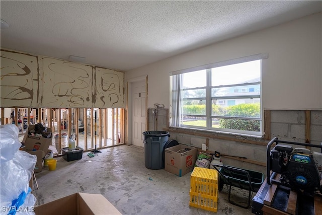 misc room featuring a textured ceiling