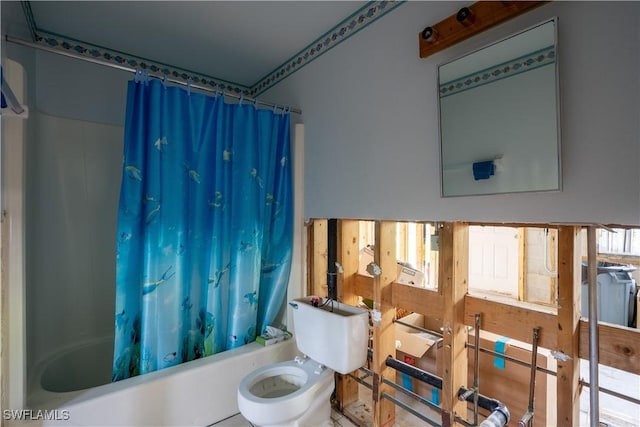 bathroom with toilet and shower / bathtub combination with curtain