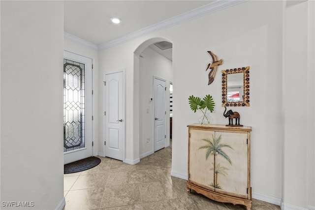 entrance foyer featuring crown molding