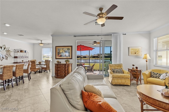 tiled living room featuring crown molding