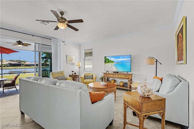 tiled living room featuring crown molding and a water view