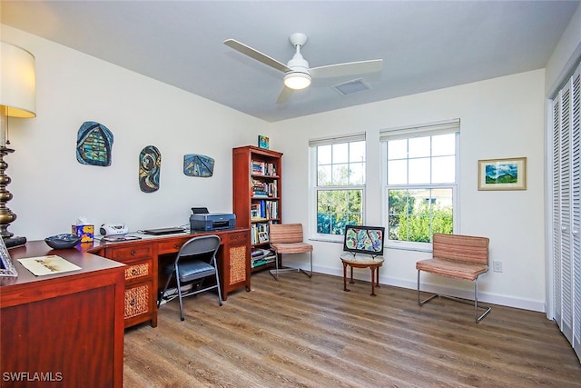 home office featuring ceiling fan and hardwood / wood-style floors