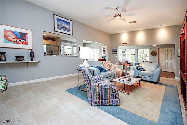 living room with ceiling fan