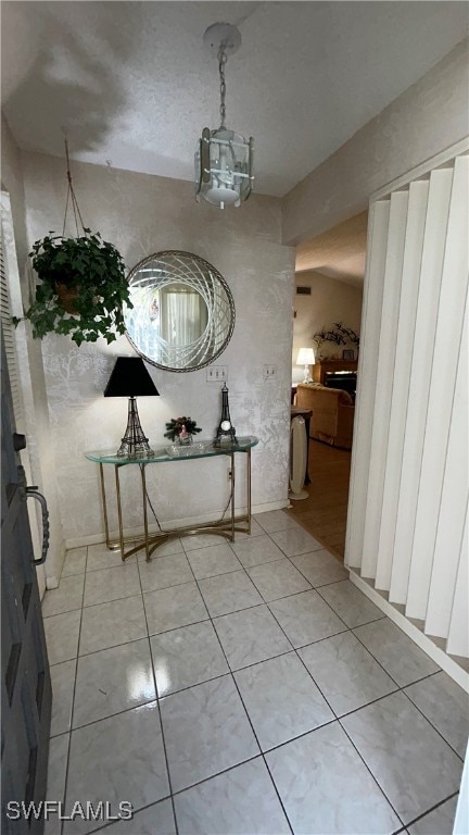 unfurnished dining area with tile patterned flooring