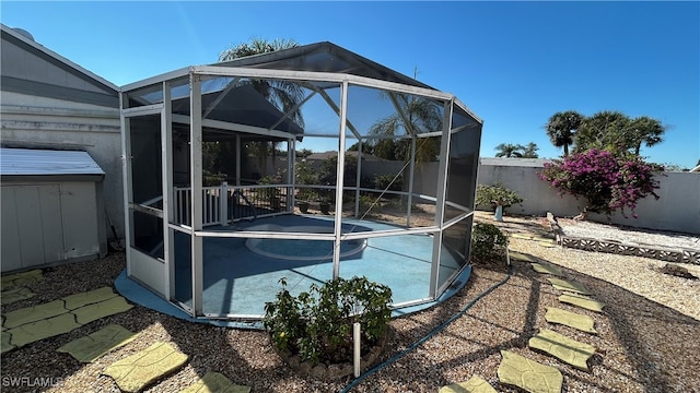 view of pool featuring a lanai