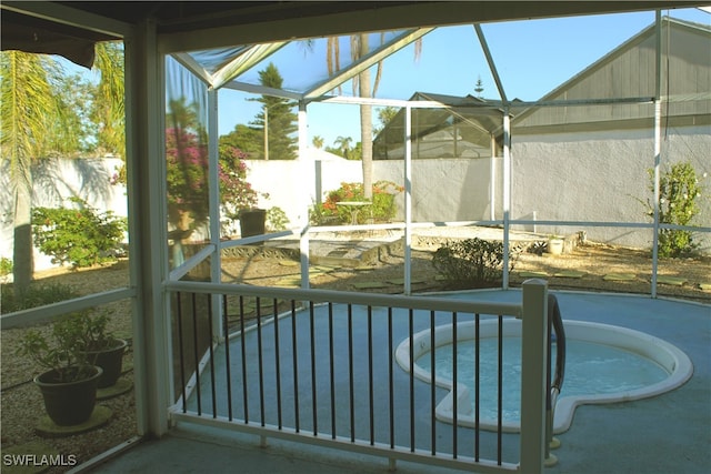 view of pool with a lanai and a patio area