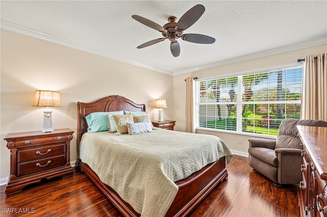 bedroom featuring a textured ceiling, dark hardwood / wood-style floors, ceiling fan, and crown molding