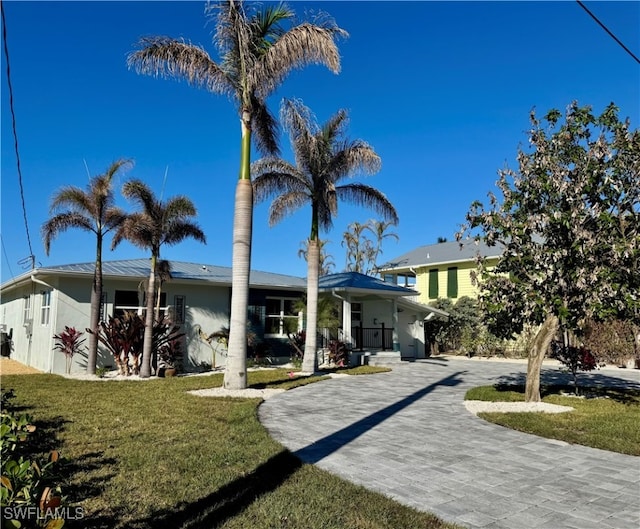 view of front of home with a front yard