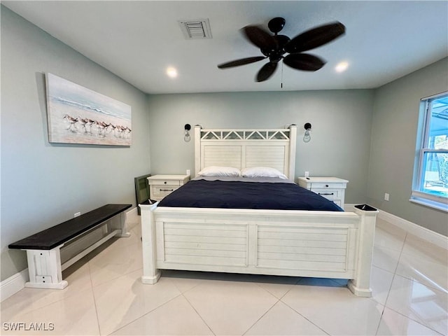 unfurnished bedroom featuring light tile patterned flooring and ceiling fan