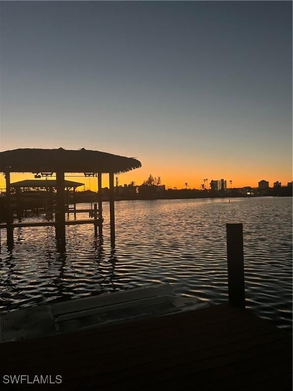 view of dock with a water view