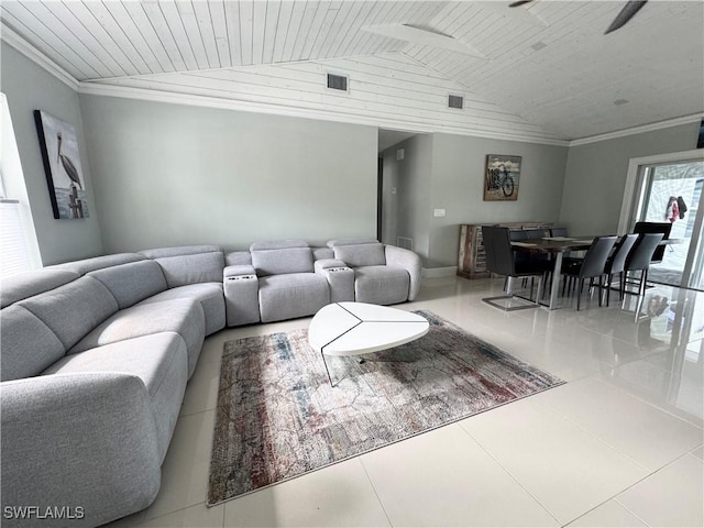 tiled living room featuring wood ceiling and vaulted ceiling