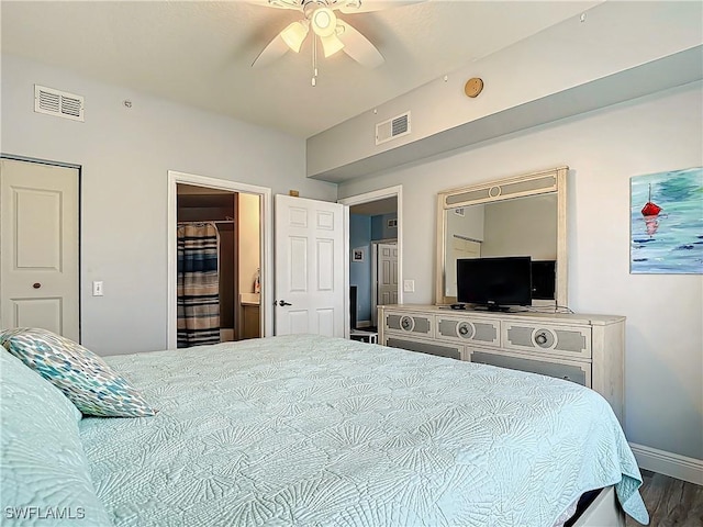 bedroom with wood-type flooring and ceiling fan